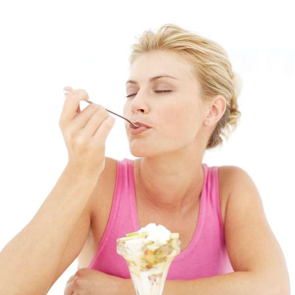 Woman eating dessert