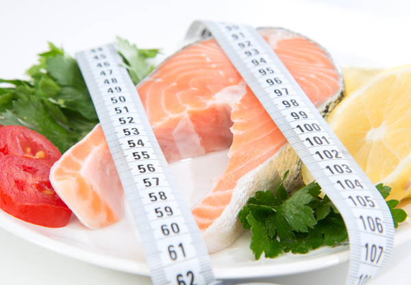 Salmon and veggies, measuring tape